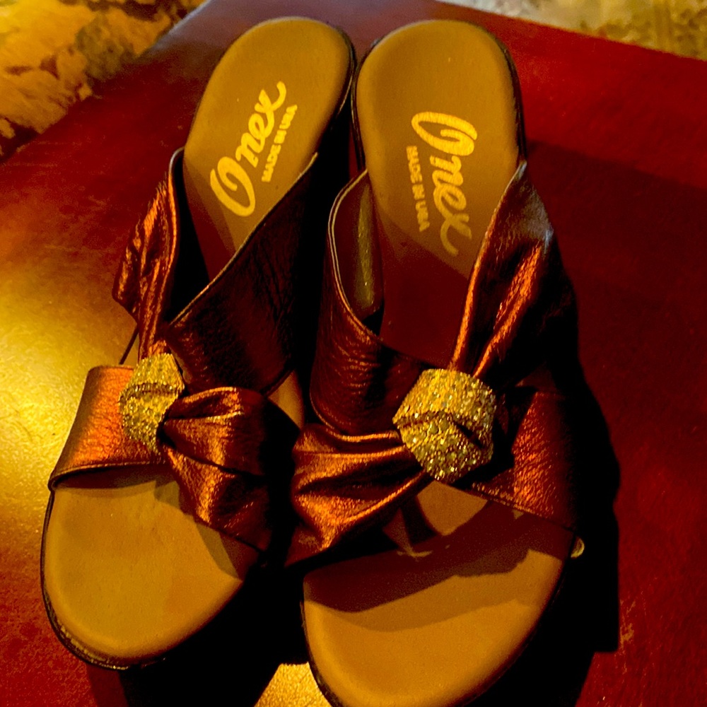 Onex brand like new beautiful slides. Leather, jeweled, very nice, comfortable